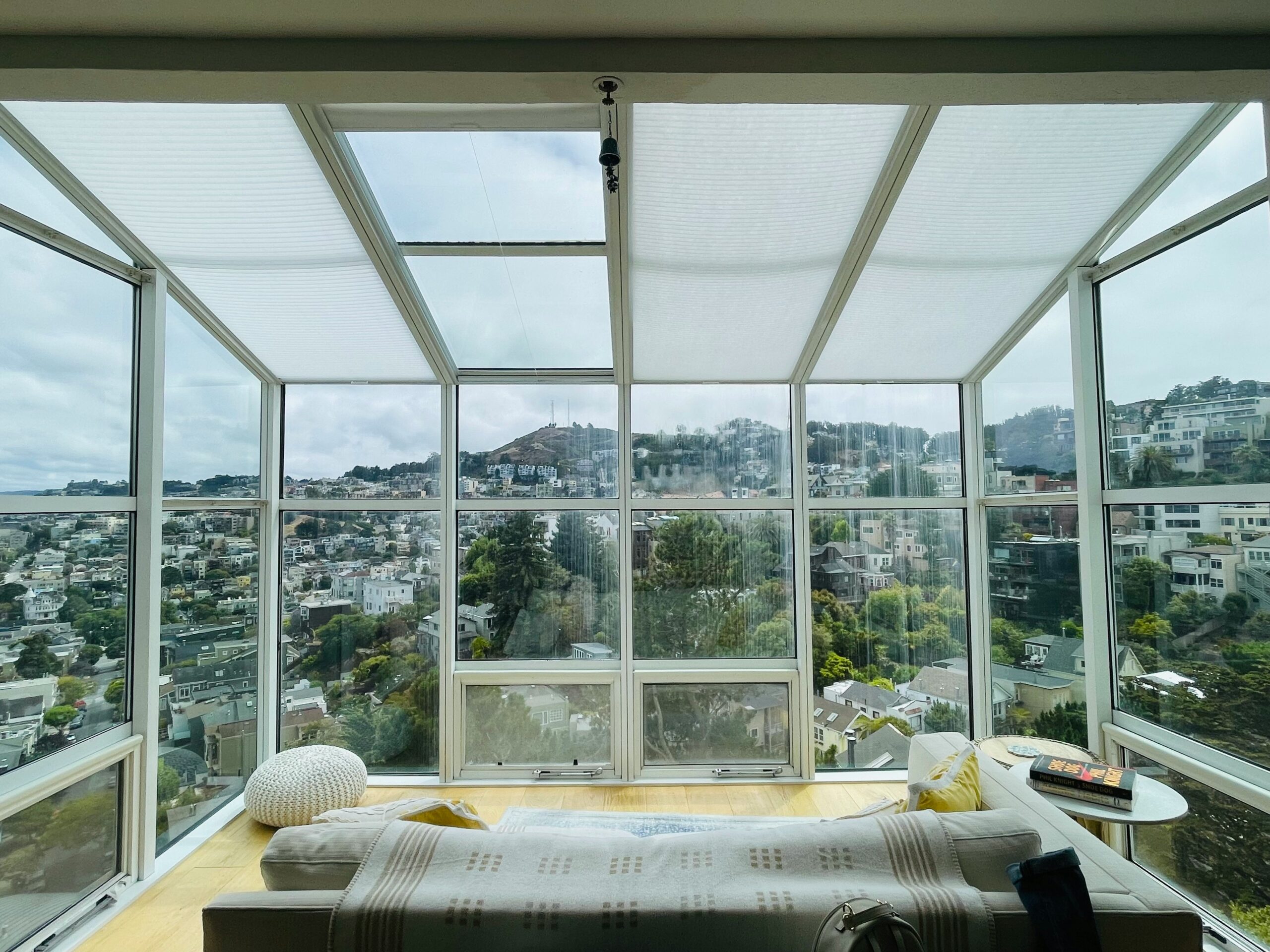 Energy-efficient window installation in Los Angeles home with panoramic glass views
